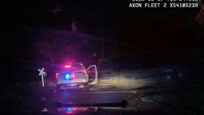 Video shows train hit Colorado officer’s car with suspect inside - fox29.com - state Colorado