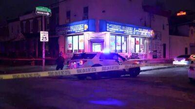 Police: Man shot at least 20 times and killed inside SW Philly corner store, 2 suspects sought - fox29.com