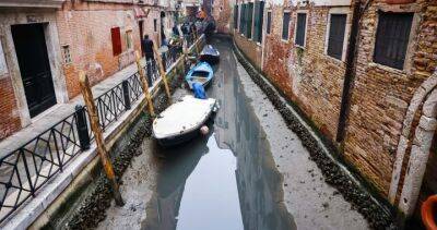 Grounded gondolas: Venice canals dry up amid Italy drought - globalnews.ca - Italy - city Venice