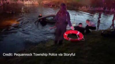 Watch: 2 rescued out of sinking vehicle in North Jersey pond; 'I got your purse' - fox29.com - state New Jersey - Jersey - county Morris