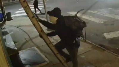 Caught on camera: Suspects climb ladder, drop from ceiling in North Philadelphia burglary - fox29.com